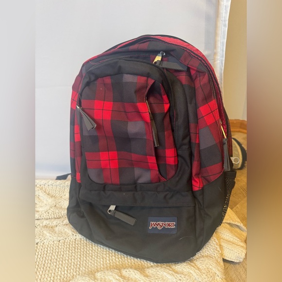 Jansport Other - Jansport backpack like new red and black plaid w 2 main pockets + small front